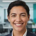 Taslim Felthouse smiling in a modern office setting